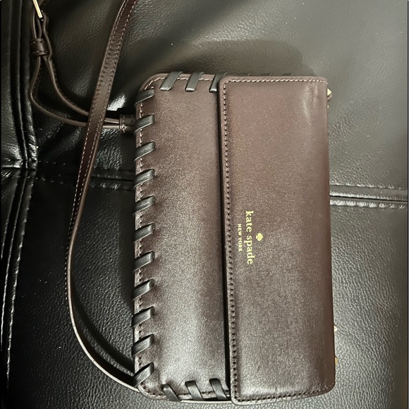 Rich chocolate brown mini bag has an adjustable shoulder strap and gold letters - Picture 2 of 12